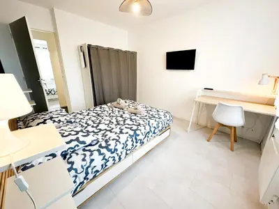 Un ou plusieurs lits dans un hébergement de l'établissement COLIVING - WIFI - TV - Proche TRAM - L'ESCALE PARTAGEE