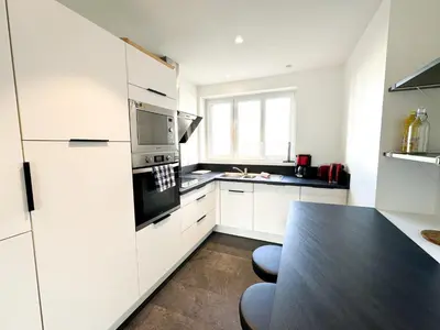 Cuisine ou kitchenette dans l'établissement COLIVING - WIFI - TV - Proche TRAM - L'ESCALE PARTAGEE