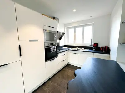 Cuisine ou kitchenette dans l'établissement COLIVING - WIFI - TV - Proche TRAM - L'ESCALE PARTAGEE