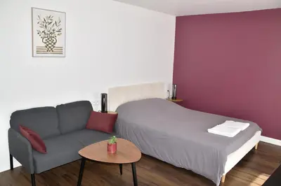Un ou plusieurs lits dans un hébergement de l'établissement Zen Cottage - Centre ville