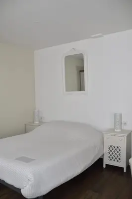 Un ou plusieurs lits dans un hébergement de l'établissement Zen Cottage - Centre ville