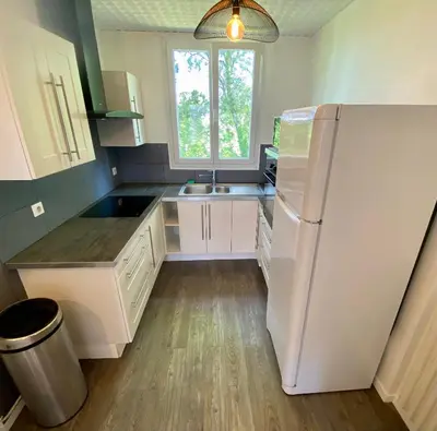 Cuisine ou kitchenette dans l'établissement Charmant T3 proche centre ville