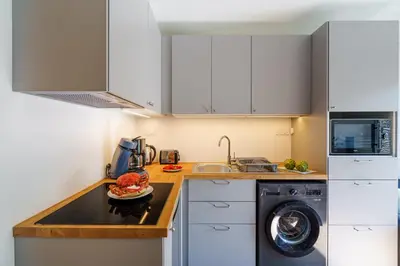 Cuisine ou kitchenette dans l'établissement Ty Koad - maison avec grande terrasse