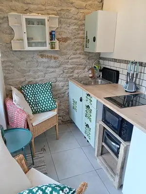 Cuisine ou kitchenette dans l'établissement Le Nid du rouge-gorge
