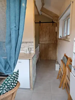 Cuisine ou kitchenette dans l'établissement Le Nid du rouge-gorge