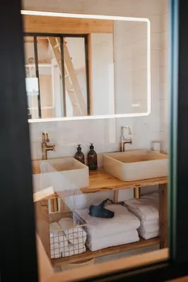 Salle de bains dans l'établissement La Grange à Sable