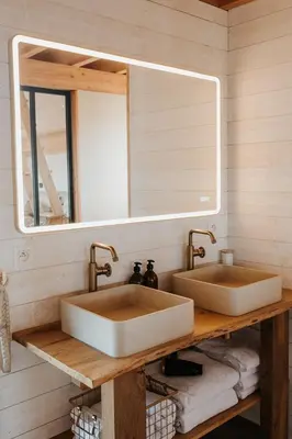 Salle de bains dans l'établissement La Grange à Sable
