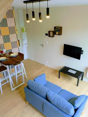 Télévision ou salle de divertissement dans l'établissement Appt Centre ville 2 pers Ty Basroz