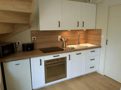 Cuisine ou kitchenette dans l'établissement Appt Centre ville 2 pers Ty Basroz