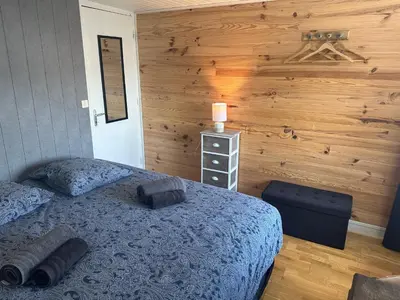 Un ou plusieurs lits dans un hébergement de l'établissement Belle maison au calme - accès GR34