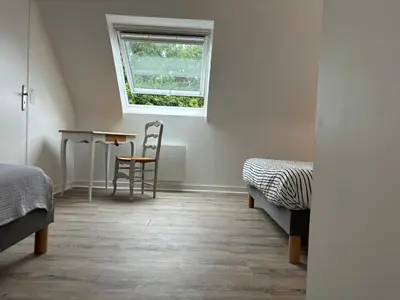 Un ou plusieurs lits dans un hébergement de l'établissement Maisonnette bretonne typique Beg Meil Fouesnant Ty Breizh plage