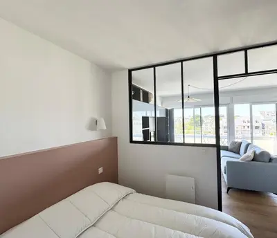 Un ou plusieurs lits dans un hébergement de l'établissement Appartement rénové vue mer, Bénodet