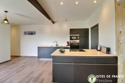 Cuisine ou kitchenette dans l'établissement Villa le nid des dunes & spas - la villa