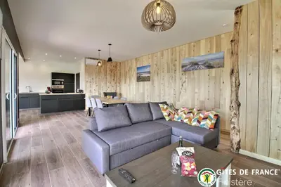 Coin salon dans l'établissement Villa le nid des dunes & spas - la villa
