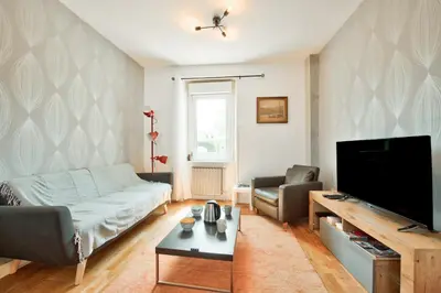 Télévision ou salle de divertissement dans l'établissement Maison pour 8 dans le centre de Plouguerneau