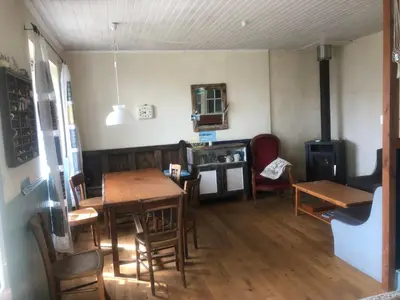 Coin salon dans l'établissement Ferienhaus Bretagne Pointe du Raz