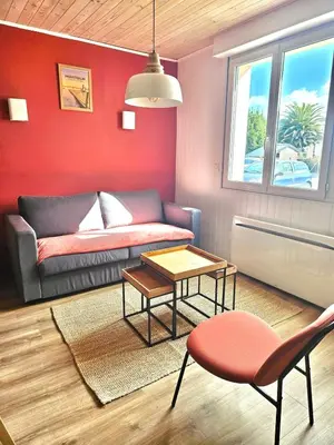 Coin salon dans l'établissement Appartement Cosy 600m de la plage