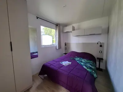 Un ou plusieurs lits dans un hébergement de l'établissement Camping de La Piscine