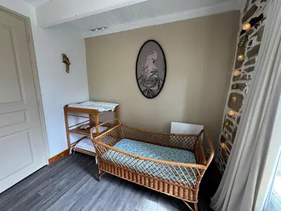 Un ou plusieurs lits dans un hébergement de l'établissement Maison bretonne en pierre à deux kms de la mer