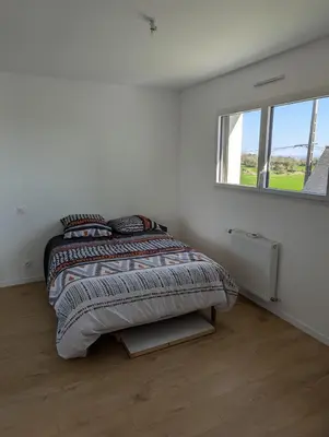 Un ou plusieurs lits dans un hébergement de l'établissement Magnifique maison proche des plages