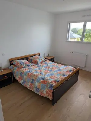 Un ou plusieurs lits dans un hébergement de l'établissement Magnifique maison proche des plages