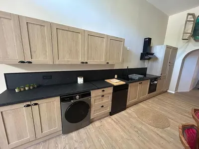 Cuisine ou kitchenette dans l'établissement Appartement dans un moulin avec terrasse