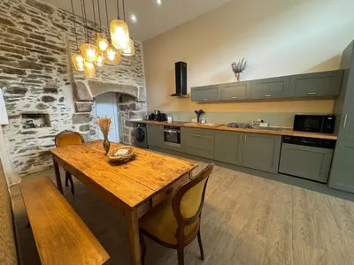 Cuisine ou kitchenette dans l'établissement Appartement dans un moulin avec terrasse