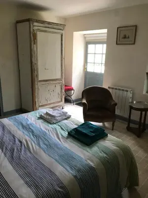 Un ou plusieurs lits dans un hébergement de l'établissement Chambres d'hôtes à Keraudy