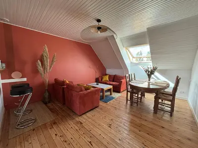 Coin salon dans l'établissement Bel appartement avec jardin à la campagne
