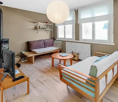 Coin salon dans l'établissement Maison plages & centre à pieds - proche GR34