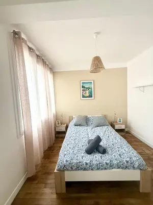 Un ou plusieurs lits dans un hébergement de l'établissement Appartement avec chambre séparée Brest centre ville