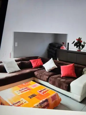 Coin salon dans l'établissement Maison familiale
