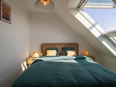 Un ou plusieurs lits dans un hébergement de l'établissement Holiday Home Les reflets bleus by Interhome