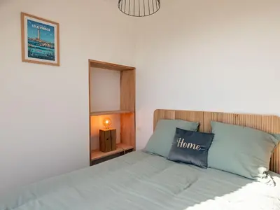 Un ou plusieurs lits dans un hébergement de l'établissement Holiday Home Les reflets bleus by Interhome