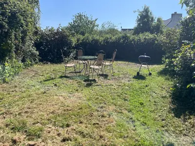Jardin de l'établissement Petit gîte cosy proche de la mer, jardin privatif