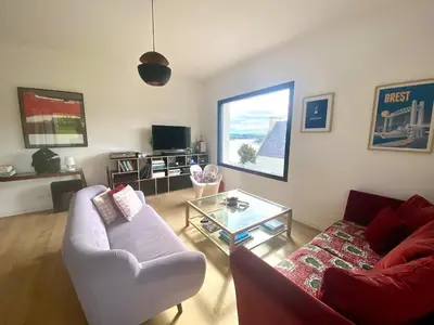 Télévision ou salle de divertissement dans l'établissement Villa de la Pointe