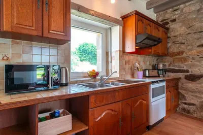Cuisine ou kitchenette dans l'établissement Soupic - A proximité de la mer