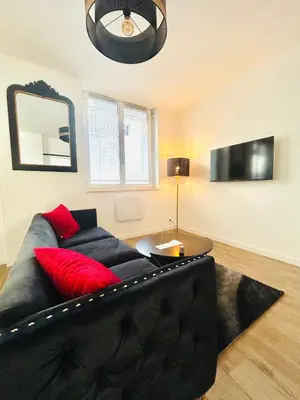 Télévision ou salle de divertissement dans l'établissement Le Balnéo - Espace détente centre ville