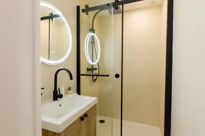 Salle de bains dans l'établissement Suite Baniléa & Spa