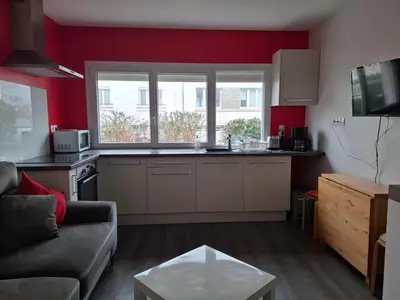 Cuisine ou kitchenette dans l'établissement Beau studio rez de chaussée