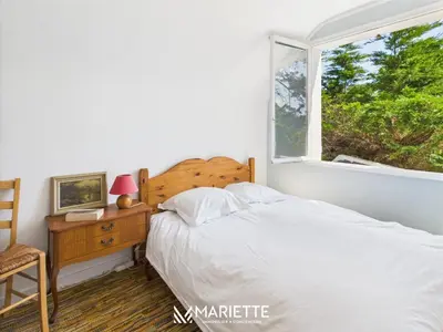 Un ou plusieurs lits dans un hébergement de l'établissement Mery Maison familiale les pieds dans l eau