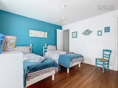 Un ou plusieurs lits dans un hébergement de l'établissement Maison Ty Gwen - Centre-ville avec jardin et proche de la plage