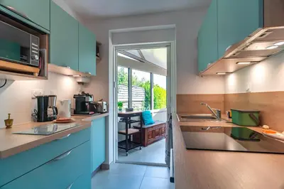 Cuisine ou kitchenette dans l'établissement Ti Job - 1,5km de la Plage