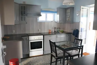 Cuisine ou kitchenette dans l'établissement Maison de vacances vue mer et campagne