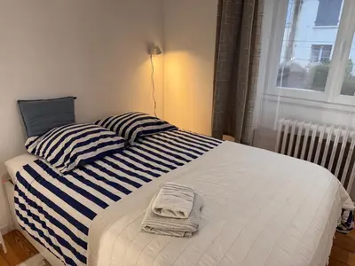 Un ou plusieurs lits dans un hébergement de l'établissement Villa Auguste chambres d'hôtes