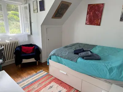 Un ou plusieurs lits dans un hébergement de l'établissement Villa Auguste chambres d'hôtes