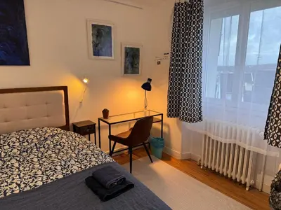 Un ou plusieurs lits dans un hébergement de l'établissement Villa Auguste chambres d'hôtes