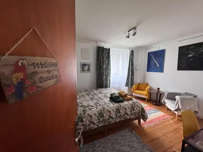 Un ou plusieurs lits dans un hébergement de l'établissement Villa Auguste chambres d'hôtes
