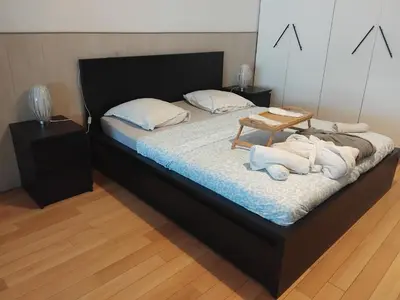 Un ou plusieurs lits dans un hébergement de l'établissement Loft de 130 m2 avec spa et billard au cœur de BREST