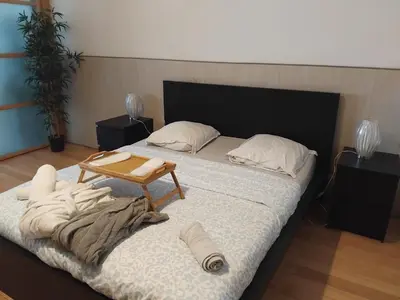 Un ou plusieurs lits dans un hébergement de l'établissement Loft de 130 m2 avec spa et billard au cœur de BREST